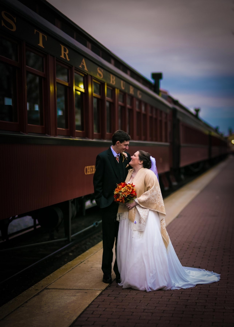 Wedding photo in front of train