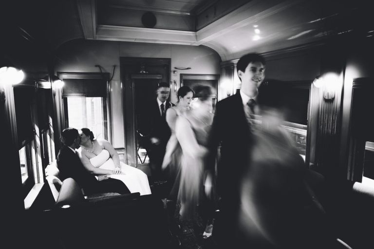 Photo of wedding party on train