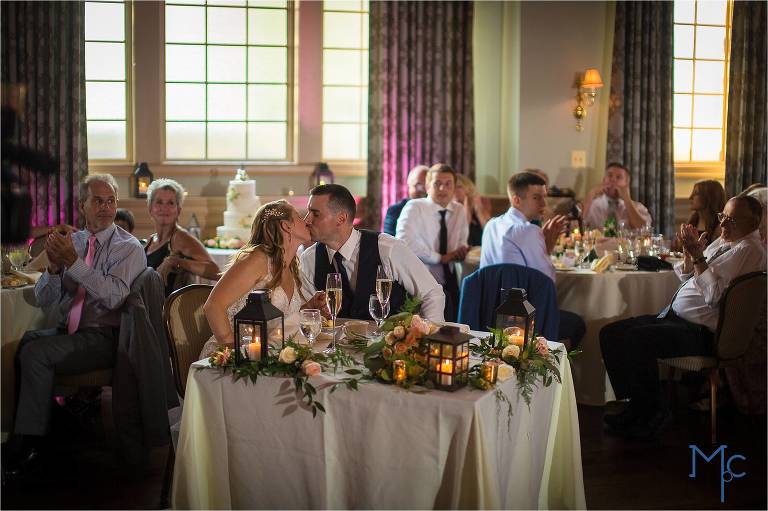 Joseph Ambler Inn Wedding bride and groom kiss in the Bonnymeade/Wheelwright Banquet Room